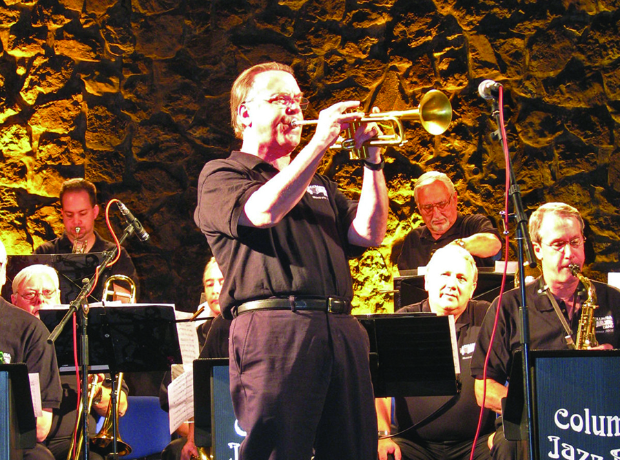 John Wilson playing his trumpet